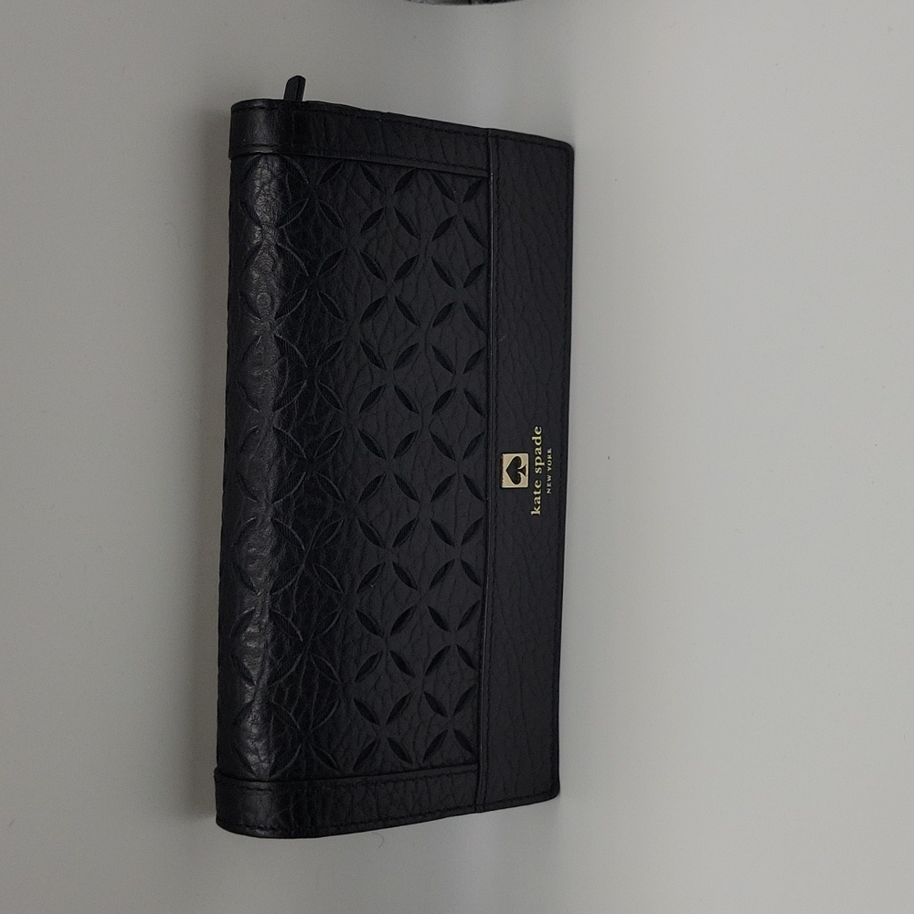 Kate spade black perforated leather wallet wristlet. Gently used.
